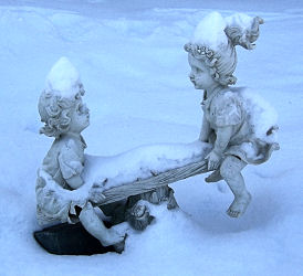 garden statue in snow